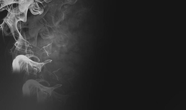 Cigarette smoke over black wall. Healthcare nonsmoking addictions concept. Abstract background for posters and flyers.