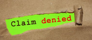 İddia reddedildi. Yırtık kağıdın altındaki cümle metni. Sigorta ve Garanti kavramı.