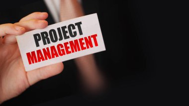 Kart işadamı tutanaklarındaki PROJECT MANAGEMENT sözcükleri. Parlak konsept.