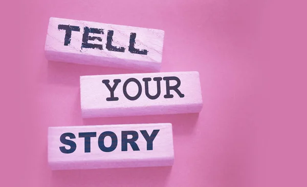 Tell your story word on wooden blocks. Testimonial examples storytelling copywriting case study education and business concept.