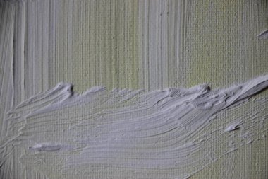 Üzerine boya sıçramış tuval. Yakından bak. 