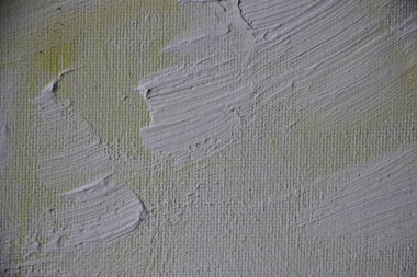 Üzerine boya sıçramış tuval. Yakından bak. 