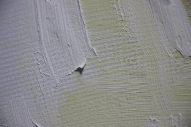 Üzerine boya sıçramış tuval. Yakından bak. 