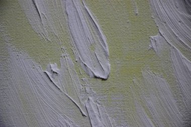 Üzerine boya sıçramış tuval. Yakından bak. 