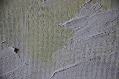 Üzerine boya sıçramış tuval. Yakından bak. 