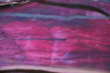 Üzerine boya sıçramış tuval. Yakından bak. 