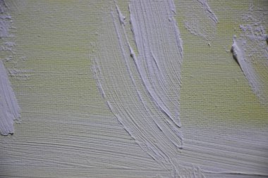 Üzerine boya sıçramış tuval. Yakından bak. 