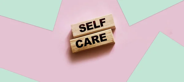 Self Care Words Printed Wooden Blocks Self Treatment Concept Pink — Stock Photo, Image