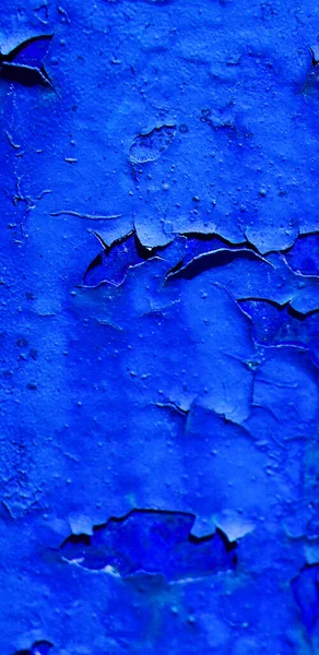 Çatlak mavi bir duvarın arka plan dokusu