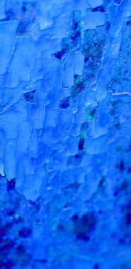 Çatlak mavi bir duvarın arka plan dokusu