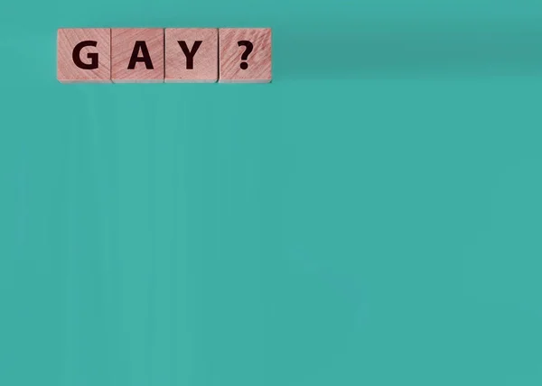 黒い机の上の木製のブロックからのゲイの単語 Lgbtq社会性的指向平等の概念 — ストック写真