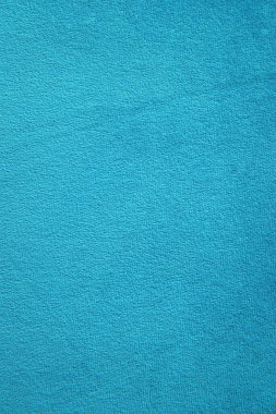 Turkuaz süet kumaş. Yakın plan. Mobilya döşemeleri için tekstil. Kumaşın dokusu. Sert ve yumuşak yüzey.