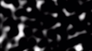 Beyaz bulanık benekli hareket arkaplanı olan sade siyah arkaplan. Kusursuz Soyut dinamik arkaplan şablonu, 4k döngü monokrom gradyan renk video oynatıcı