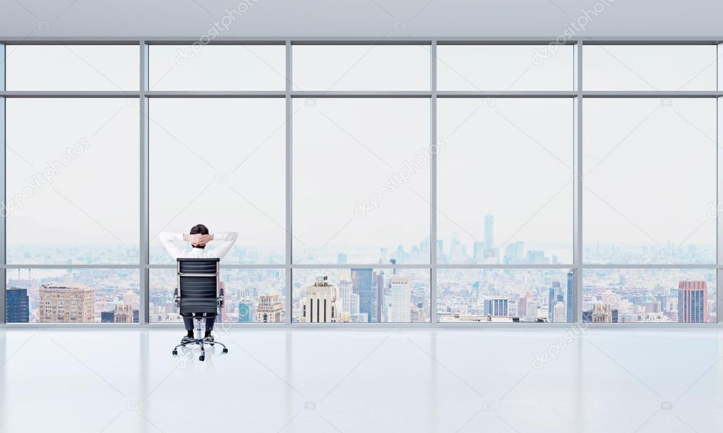 Man looking into window and thinking