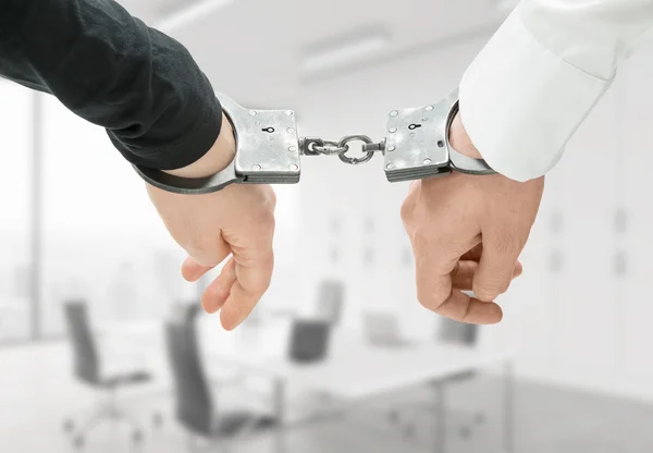 Hands in handcuffs — Stock Photo, Image