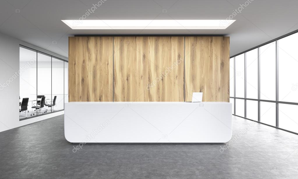 Empty office, white reception at wooden wall. Panoramic window right, meeting room left.
