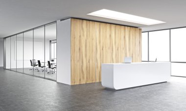 Empty office, white reception at wooden wall.