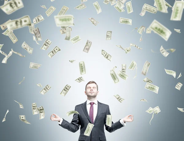 Businessman getting money — Stock Photo, Image