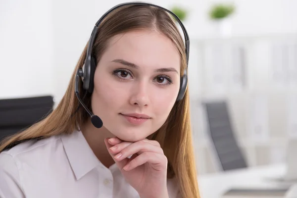 Businesswoman in headphones — Stock Photo, Image