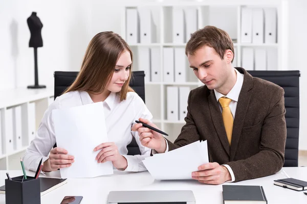 Businessman and businesswoman at work — Stock Photo, Image