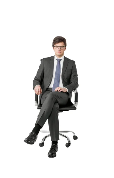 Biznesmen na fotelu — Zdjęcie stockowe