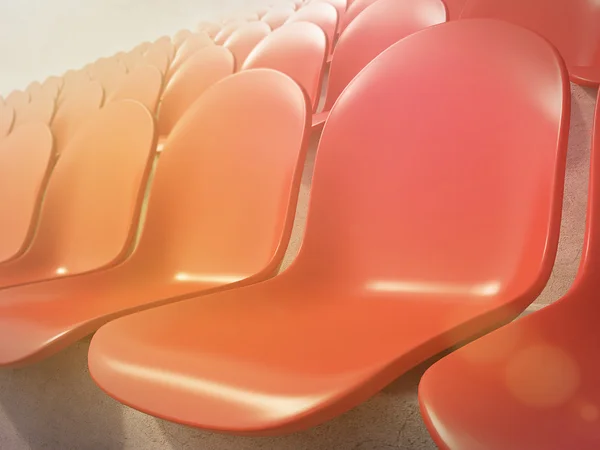 Assentos de plástico vermelho — Fotografia de Stock