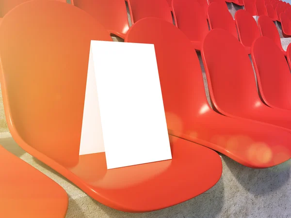 Placard en asiento rojo en el estadio. De cerca. . — Foto de Stock