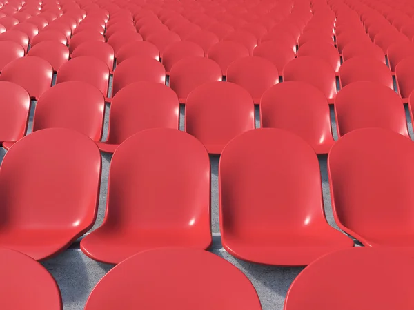 Asientos de plástico rojo — Foto de Stock