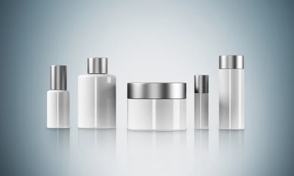 Row of cream boxes of different shapes. Grey background. Concept of cosmetics. Mock up. 3D rendering — Stock Photo, Image