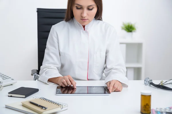 Læge på arbejdspladsen - Stock-foto