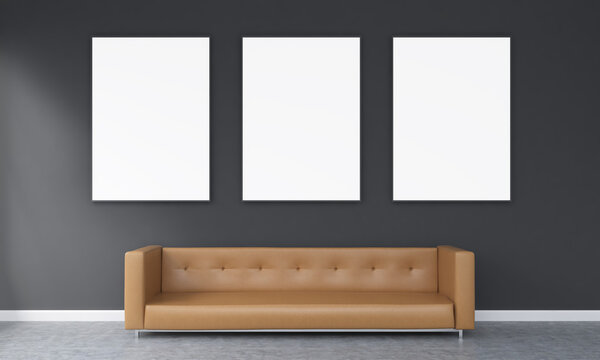 Three white frames brown sofa