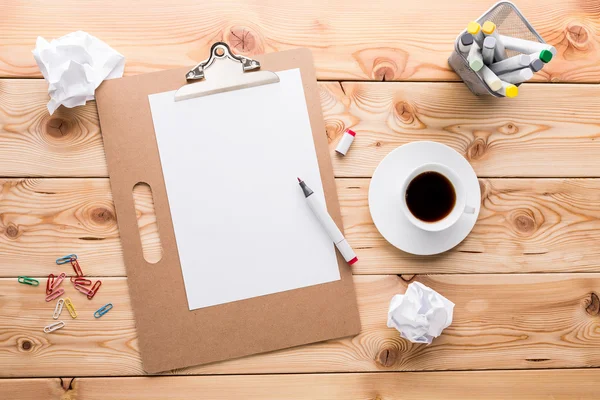 Desktop with paper and coffee — Stock Photo, Image