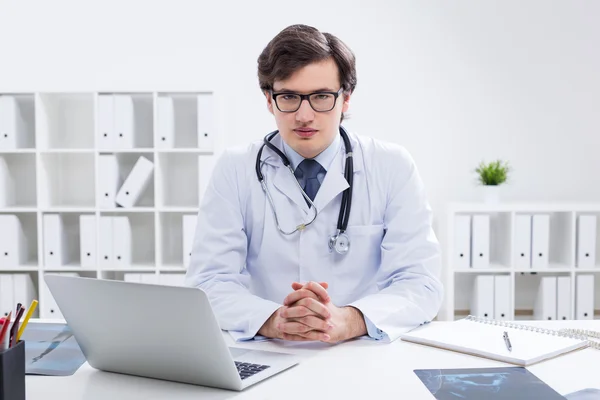 Young doctor in office — Stock Photo, Image