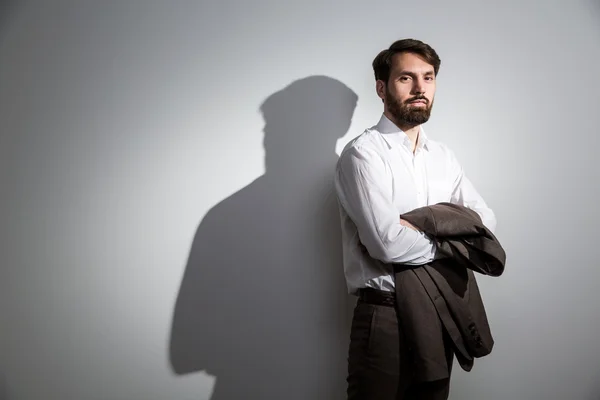 Suit in hand shadow — Stock Photo, Image