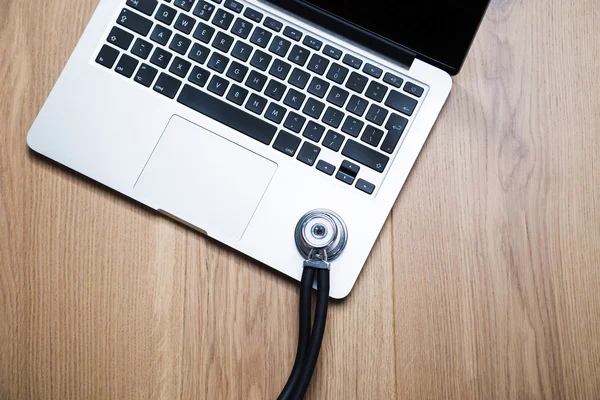 Stethoscope and notebook top — Stock Photo, Image