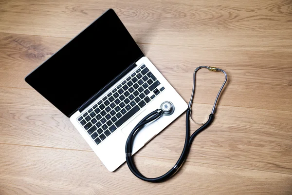 Notebook and stethoscope top — Stock Photo, Image