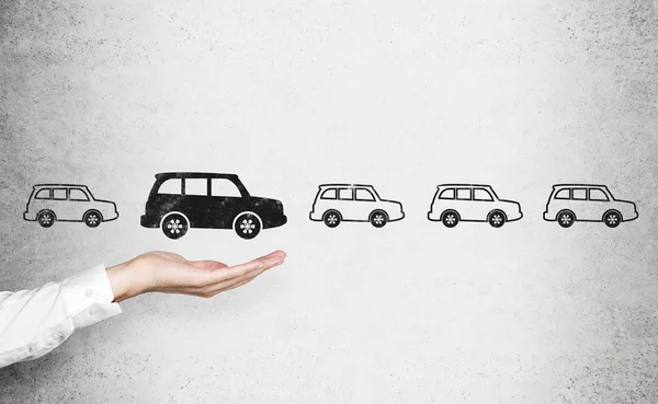 Man choosing black car — Stock Photo, Image