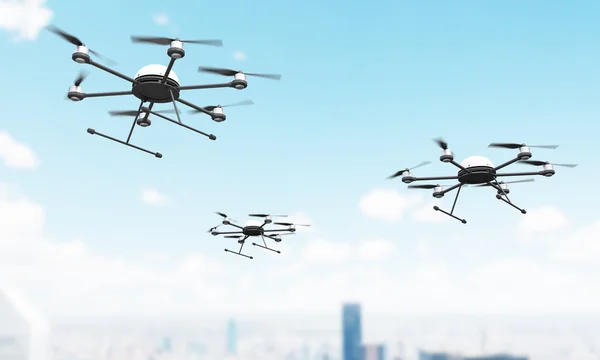 Quadrocopters sobre la ciudad — Foto de Stock