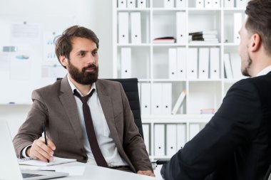 Gelecekteki işbirliği tartışırken iş adamları