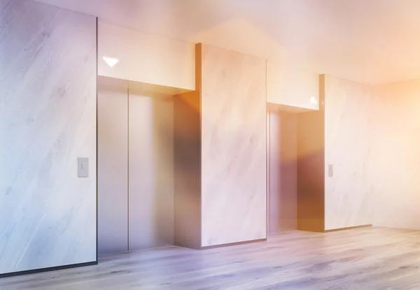 Interior tonificado con ascensores —  Fotos de Stock