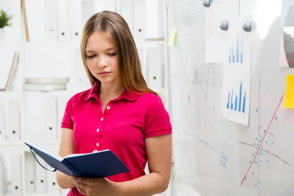 Attractive woman with organizer — Stock Photo, Image