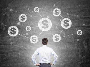 İşadamı dolar ağına bakıyor