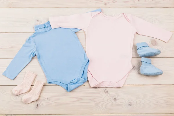 Baby bodysuits and socks — Stock Photo, Image