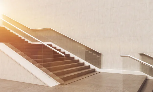 Stylish sunlit starecase in modern building — Stock Photo, Image