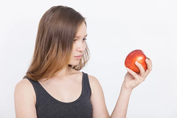 Jovencita con manzana —  Fotos de Stock