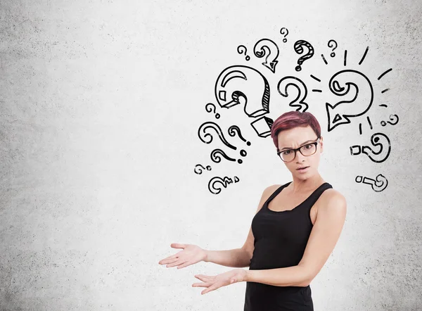 Woman and question mark wall — Stock Photo, Image