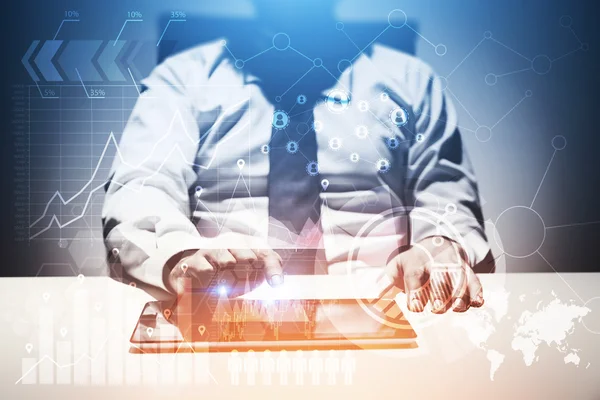 Company executive working with his tablet at desk. Concept of CEO work and management. Elements of this image furnished by NASA. Toned image. Double exposure