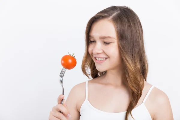 Girl with tomato — Stock Photo, Image