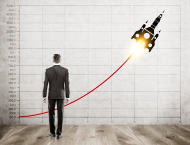 İşadamı ve gökyüzü roket krokisi