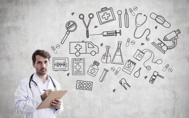 Erkek doktor ve tıbbi simgeler